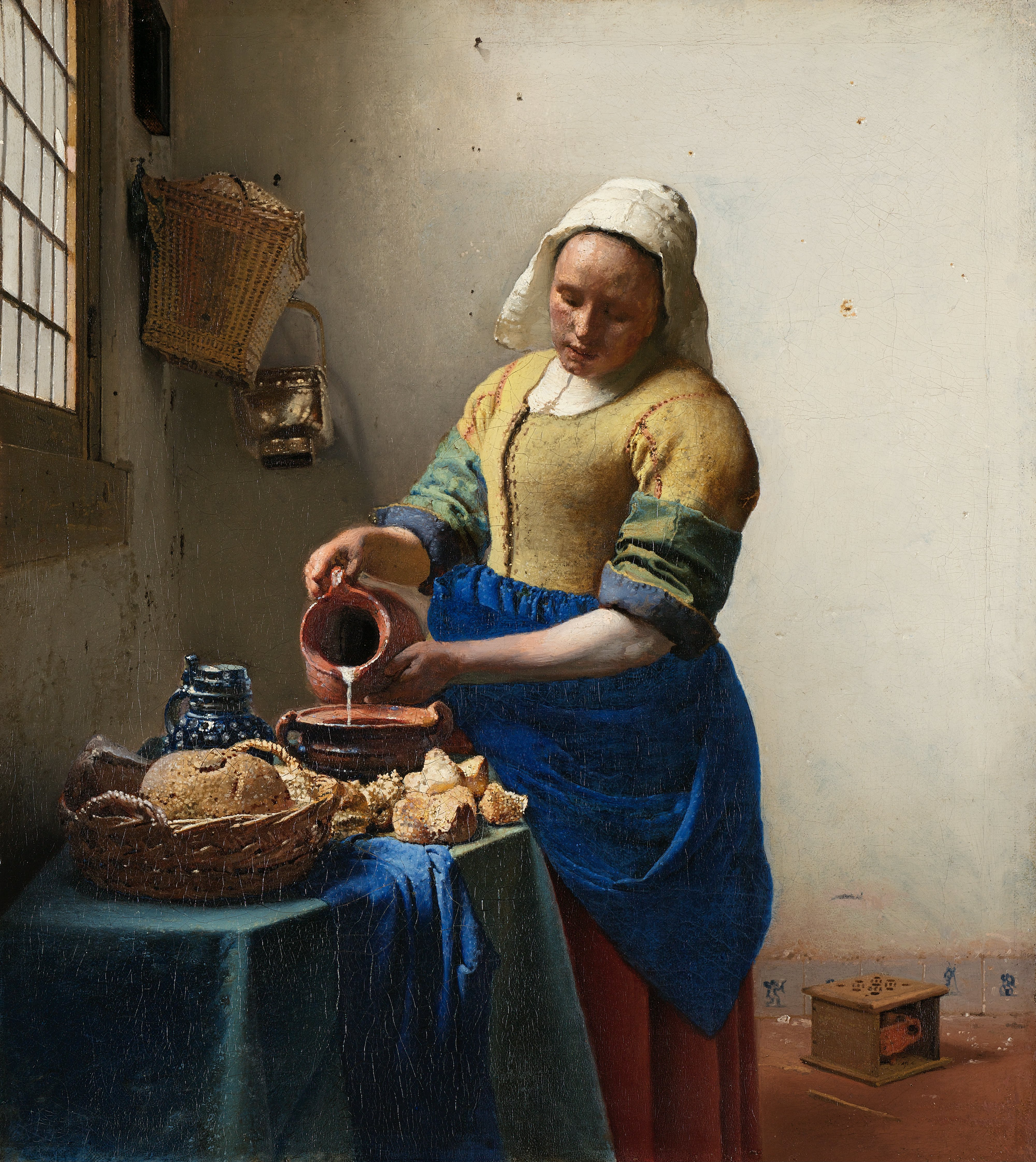 ヨハネス・フェルメール「牛乳を注ぐ女」（1657〜1658年頃）アムステルダム国立美術館所蔵